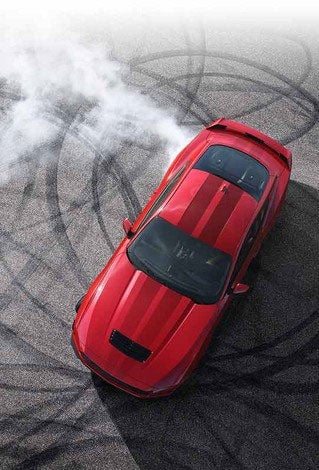 Overhead view of a 2024 Ford Mustang® model with tire tracks on pavement | Bergstrom Ford of Neenah in Neenah WI