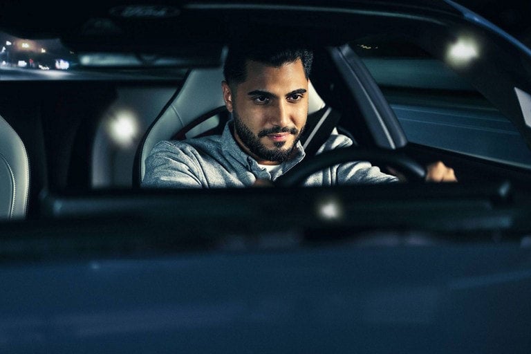 Person sitting in the driver’s seat of a parked 2024 Ford Mustang® coupe | Bergstrom Ford of Neenah in Neenah WI